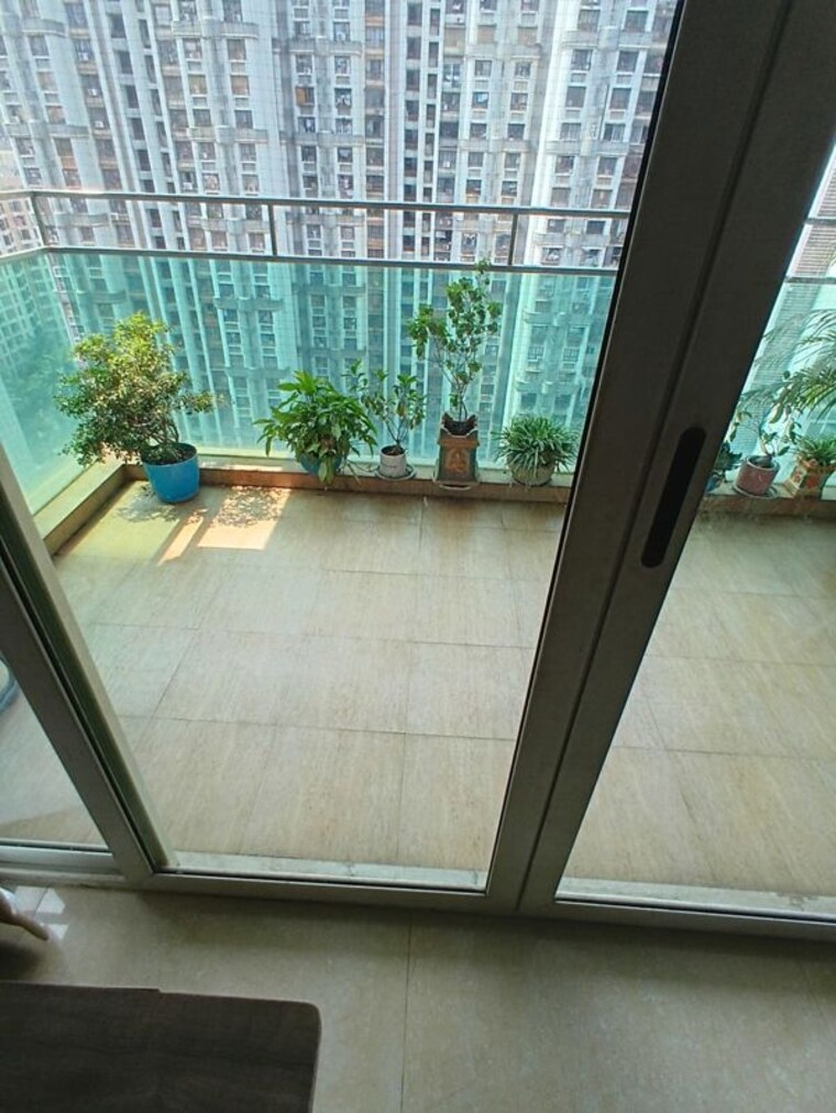 Balcony, lokhandwala-whispering-palms-xxclusives 4 Bedroom 2360 Sq.Ft. Apartment In Kandivali East Mumbai 10761065
