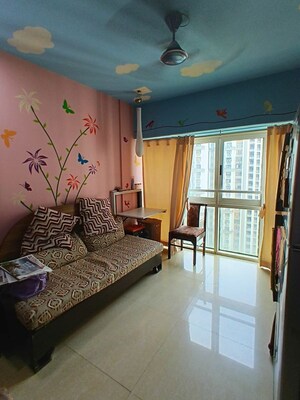Living Room in 4 BHK Apartment at Lokhandwala Whispering Palms XXclusives, Kandivali East – for Rent