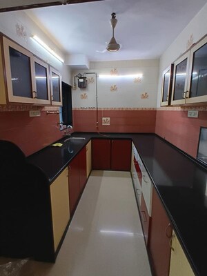 Kitchen in 3 BHK Apartment at Lokhandwala Whispering Palms, Kandivali East – for Sale