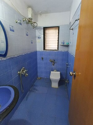 Bathroom in 3 BHK Apartment at Lokhandwala Whispering Palms, Kandivali East – for Sale