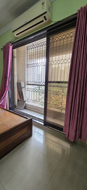 Room in 2 BHK Apartment at Shree Ambika Complex, Ghansoli – for Rent