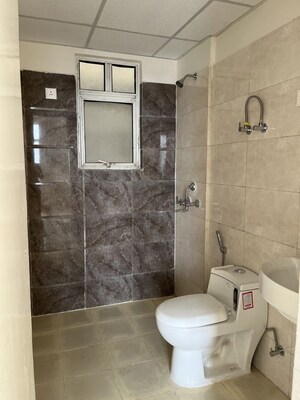 Bathroom in 2 BHK Apartment at Mittal Rajnagar Residency, Raj Nagar Extension – for Sale