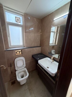 Bathroom in 3 BHK Apartment at Smart World Orchard, Sector 61 – for Rent