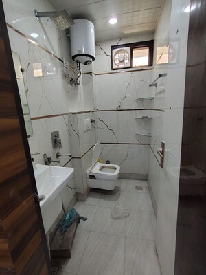 Bathroom in 3 BHK Builder Floor at Dwarka Mor – for Rent