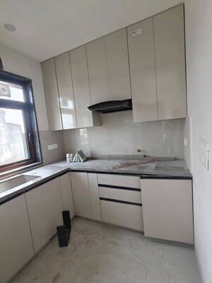 Kitchen in 2 BHK Apartment at Ansal Highland Park, Sector 103 – for Sale
