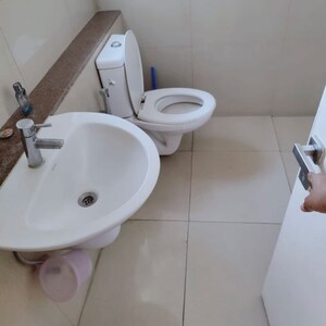 Bathroom in 3 BHK Apartment at Emaar Palm Gardens, Sector 83 – for Rent