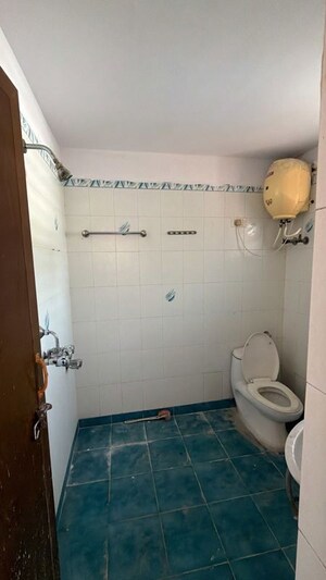 Bathroom in 3 BHK Apartment at Morabadi – for Rent