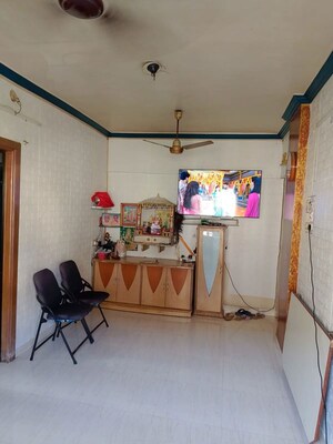 Living Room in 1 BHK Apartment at New Om Complex CHSL, Mira Road – for Sale