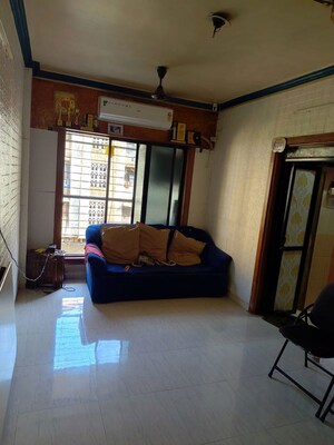 Living Room in 1 BHK Apartment at New Om Complex CHSL, Mira Road – for Sale