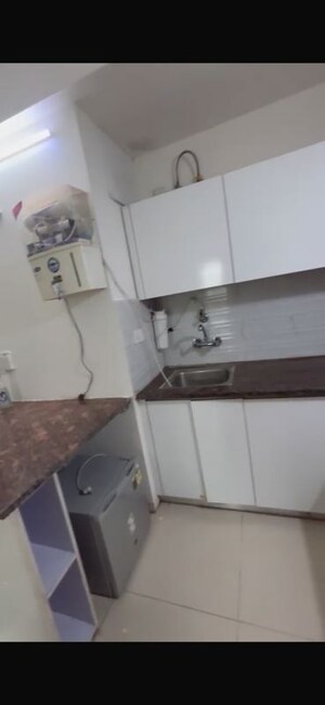 Kitchen in 1 BHK Apartment at Sunworld Arista, Sector 168 – for Rent