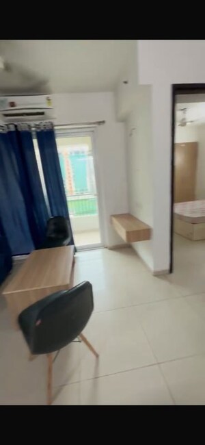 Living Room in 1 BHK Apartment at Sunworld Arista, Sector 168 – for Rent