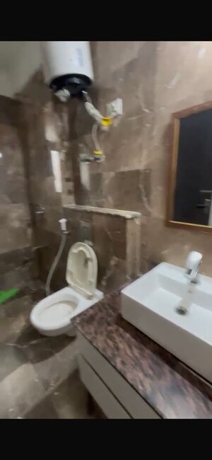 Bathroom in 1 BHK Apartment at Sunworld Arista, Sector 168 – for Rent