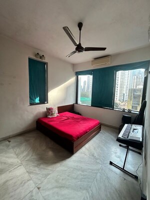 Bedroom in 1 BHK Apartment at Pushpa Vihar CHS, Colaba – for Rent