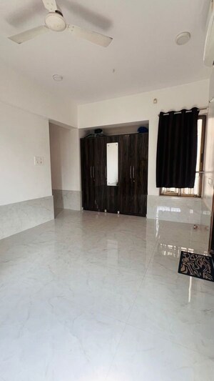 Living Room in 2 BHK Apartment at Lodha Luxuria, Majiwada – for Rent