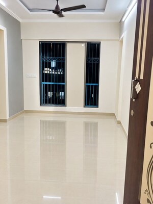 Living Room in 1 BHK Apartment at Pantan Synergy, Virar West – for Rent