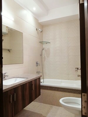 Bathroom in 4 BHK Builder Floor at East Of Kailash – for Rent