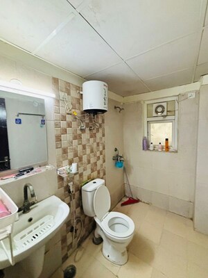 Bathroom in 3.5 BHK Apartment at ABA Ivy County, Sector 75 – for Rent