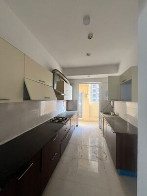 Kitchen in 3.5 BHK Apartment at ABA Ivy County, Sector 75 – for Rent