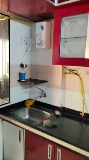 Kitchen in 2 BHK Apartment at Shah Arcade II, Malad East – for Rent