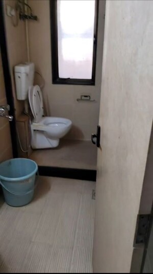 Bathroom in 2 BHK Apartment at Shah Arcade II, Malad East – for Rent