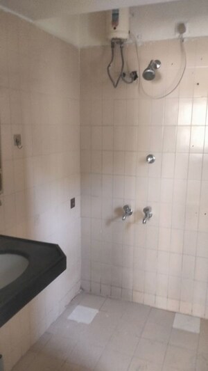 Bathroom in 2 BHK Apartment at Empire Landmark, Wanwadi – for Rent