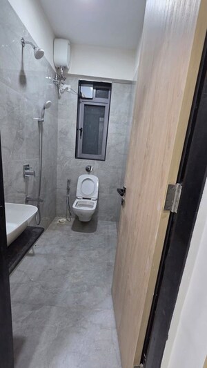 Bathroom in 1 BHK Apartment at Romell Diva, Malad West – for Rent