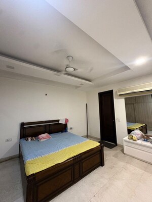 Bedroom in 4 BHK Builder Floor at Rajouri Garden – for Rent