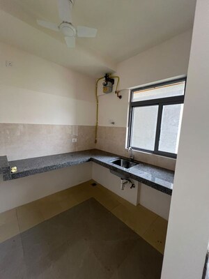 Kitchen in 2 BHK Apartment at Piramal Vaikunth, Balkum Pada – for Rent