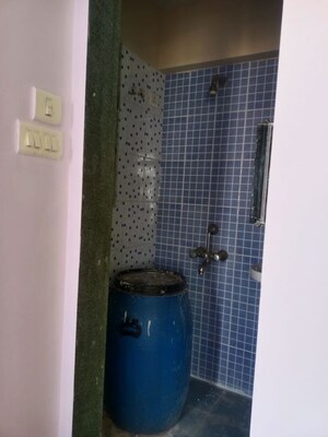 Bathroom in 1 BHK Apartment at Om Kalyani CHS, Dahisar West – for Rent