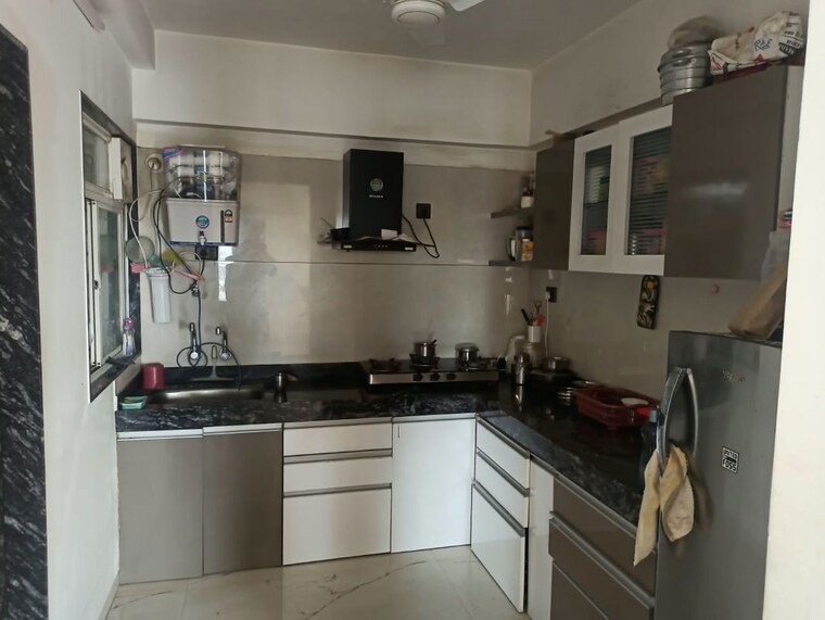 Kitchen, aeropolis-phase-ii 2 Bedroom 870 Sq.Ft. Apartment In Dhanori Pune 10762360