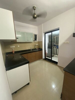 Kitchen in 2.5 BHK Apartment at Pride Park Springs, Dhanori – for Rent
