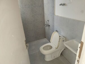 Bathroom in 2 BHK Apartment at Signature Global Golf Greens, Sector 79 – for Sale