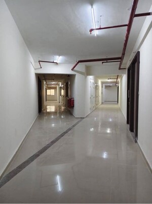 Building Lobby in 1 BHK Apartment at Satellite Garden, Goregaon East – for Rent