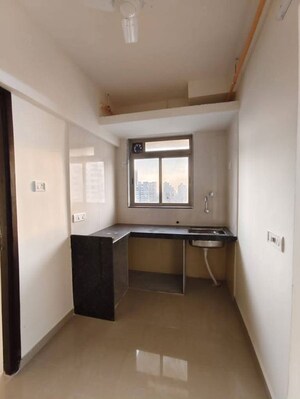 Kitchen in 1 BHK Apartment at Satellite Garden, Goregaon East – for Rent