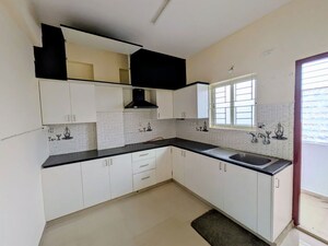 Kitchen in 2 BHK Apartment at Pyramid Carnations, Doddaballapur Road – for Rent