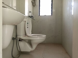 Bathroom in 1 BHK Apartment at Runwal Gardens Phase I, Dombivli East – for Rent