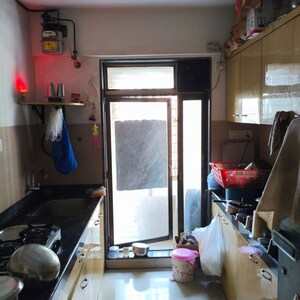 Kitchen in 2 BHK Apartment at Acme Ozone, Manpada – for Sale