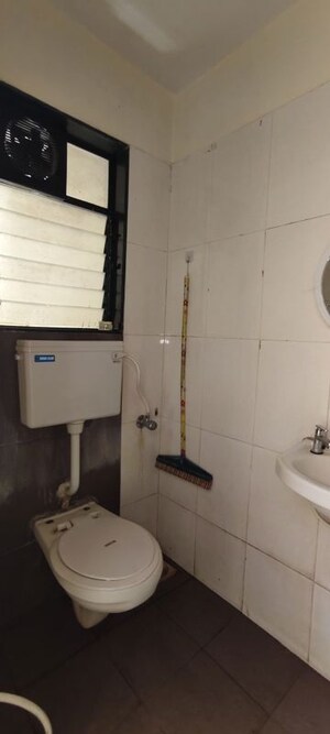 Bathroom in 1 BHK Apartment at Vini Castle, Dahisar West – for Rent