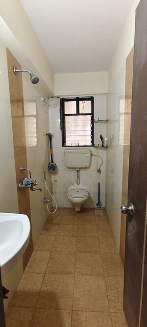 Bathroom in 1 BHK Apartment at Vini Castle, Dahisar West – for Rent