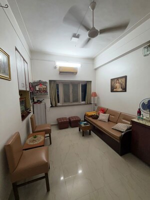 Living Room in 1 BHK Apartment at Khar West – for Rent