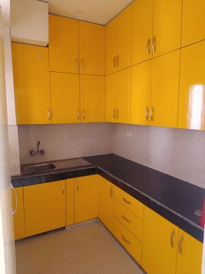 Kitchen in 2 BHK Apartment at Nitishree Aura Chimera, Raj Nagar Extension – for Sale