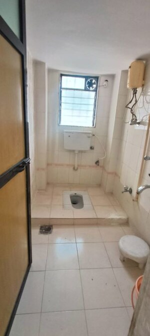 Bathroom in 2 BHK Apartment at Lok Vruksha Phase I, Kapur Bawdi – for Rent