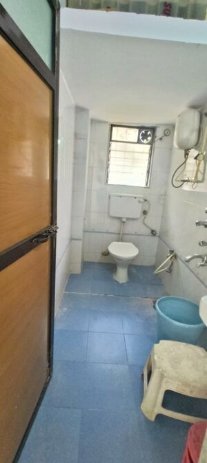 Bathroom in 2 BHK Apartment at Lok Vruksha Phase I, Kapur Bawdi – for Rent