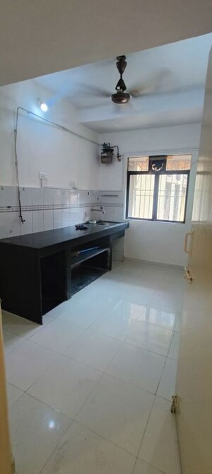 Kitchen in 2 BHK Apartment at Lok Vruksha Phase I, Kapur Bawdi – for Rent