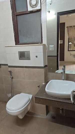 Bathroom in 2 BHK Apartment at Unitech Uniworld Gardens 2, Sector 47 – for Rent
