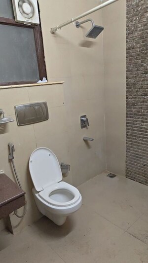 Bathroom in 2 BHK Apartment at Unitech Uniworld Gardens 2, Sector 47 – for Rent