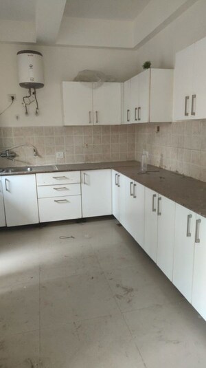 Kitchen in 3 BHK Apartment at Unitech Uniworld Gardens 2, Sector 47 – for Rent