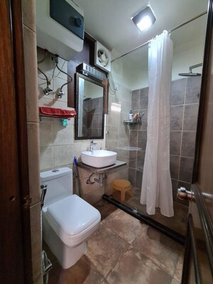 Bathroom in 3 BHK Apartment at CGHS HEWO Apartments, Sector 56 – for Sale