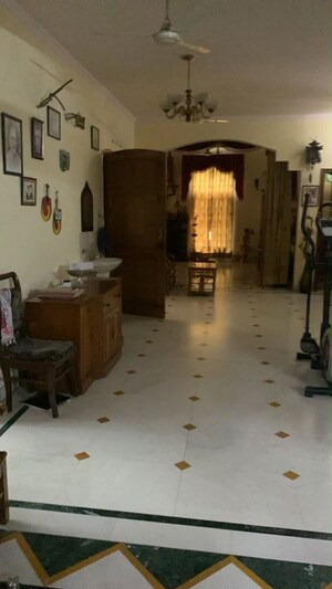 Living Room in 6+ BHK Villa at Sector 26 – for Sale