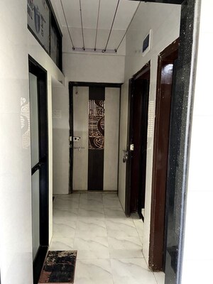 Building Lobby in 1.5 BHK Apartment at Mahaprabhu CHS, Malad West – for Rent